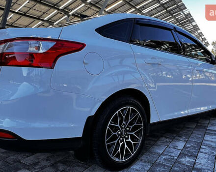 Білий Форд Фокус, об'ємом двигуна 1 л та пробігом 131 тис. км за 8500 $, фото 9 на Automoto.ua