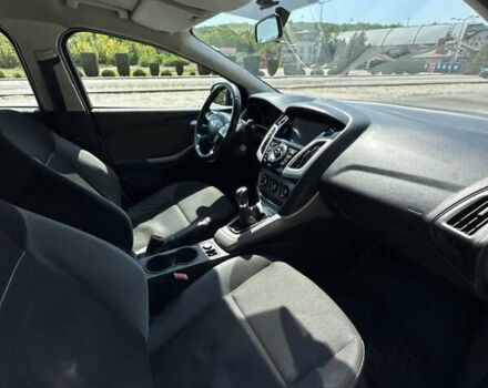 Форд Фокус 2013 в Новомосковске на Automoto.ua Белый Форд Фокус, объемом двигателя 1 л и пробегом 144 тыс. км за 7000 $, фото 2 на Automoto.ua