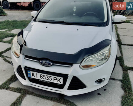Білий Форд Фокус, об'ємом двигуна 2 л та пробігом 223 тис. км за 6999 $, фото 1 на Automoto.ua