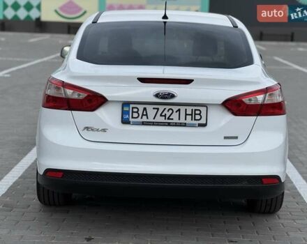 Форд Фокус 2014 в Новоукраинке на Automoto.ua Белый Форд Фокус, объемом двигателя 1 л и пробегом 141 тыс. км за 6800 $, фото 3 на Automoto.ua