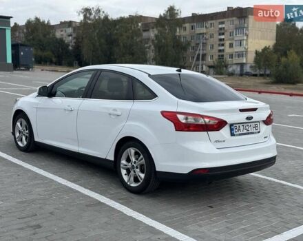 Форд Фокус 2014 в Новоукраинке на Automoto.ua Белый Форд Фокус, объемом двигателя 1 л и пробегом 141 тыс. км за 6800 $, фото 2 на Automoto.ua