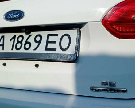 Білий Форд Фокус, об'ємом двигуна 2 л та пробігом 195 тис. км за 8999 $, фото 8 на Automoto.ua