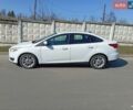 Білий Форд Фокус, об'ємом двигуна 2 л та пробігом 211 тис. км за 7600 $, фото 24 на Automoto.ua