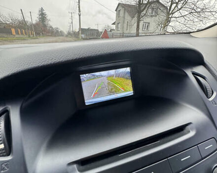 Білий Форд Фокус, об'ємом двигуна 2 л та пробігом 195 тис. км за 8999 $, фото 10 на Automoto.ua