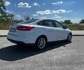 Білий Форд Фокус, об'ємом двигуна 2 л та пробігом 133 тис. км за 8299 $, фото 4 на Automoto.ua