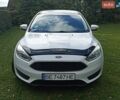 Білий Форд Фокус, об'ємом двигуна 2 л та пробігом 157 тис. км за 7499 $, фото 1 на Automoto.ua