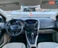 Белый Форд Фокус, объемом двигателя 2 л и пробегом 144 тыс. км за 7599 $, фото 16 на Automoto.ua