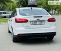 Білий Форд Фокус, об'ємом двигуна 2 л та пробігом 99 тис. км за 8600 $, фото 3 на Automoto.ua