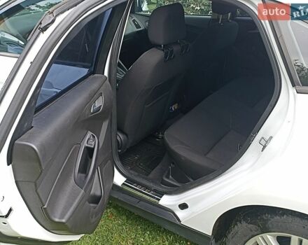 Білий Форд Фокус, об'ємом двигуна 2 л та пробігом 157 тис. км за 7499 $, фото 8 на Automoto.ua
