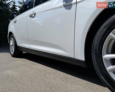Белый Форд Фокус, объемом двигателя 2 л и пробегом 178 тыс. км за 9299 $, фото 103 на Automoto.ua