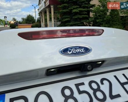 Белый Форд Фокус, объемом двигателя 2 л и пробегом 178 тыс. км за 9299 $, фото 118 на Automoto.ua