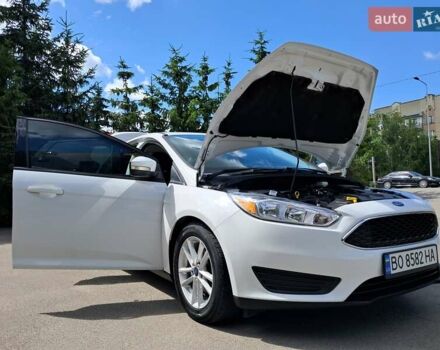 Белый Форд Фокус, объемом двигателя 2 л и пробегом 160 тыс. км за 9399 $, фото 16 на Automoto.ua