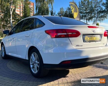 Білий Форд Фокус, об'ємом двигуна 2 л та пробігом 83 тис. км за 9400 $, фото 4 на Automoto.ua