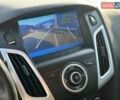 Білий Форд Фокус, об'ємом двигуна 2 л та пробігом 127 тис. км за 8990 $, фото 23 на Automoto.ua