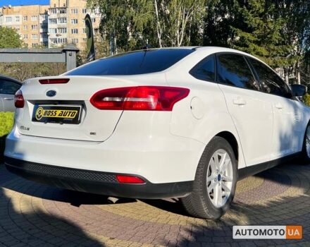 Білий Форд Фокус, об'ємом двигуна 2 л та пробігом 83 тис. км за 9400 $, фото 6 на Automoto.ua