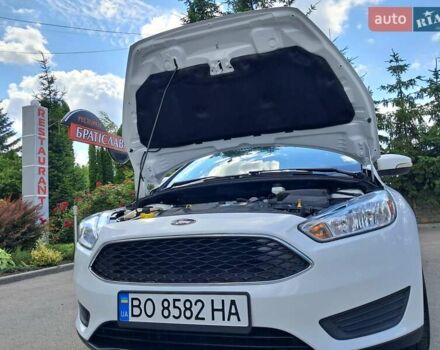 Белый Форд Фокус, объемом двигателя 2 л и пробегом 160 тыс. км за 9399 $, фото 70 на Automoto.ua