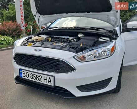 Белый Форд Фокус, объемом двигателя 2 л и пробегом 160 тыс. км за 9399 $, фото 65 на Automoto.ua