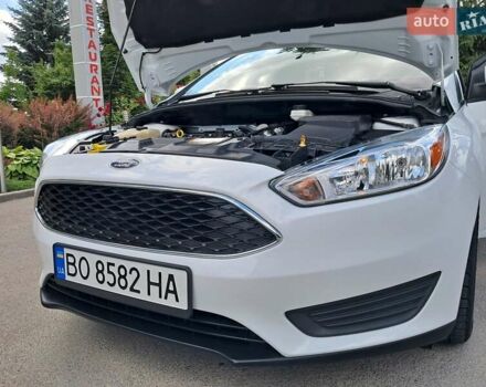 Белый Форд Фокус, объемом двигателя 2 л и пробегом 160 тыс. км за 9399 $, фото 66 на Automoto.ua