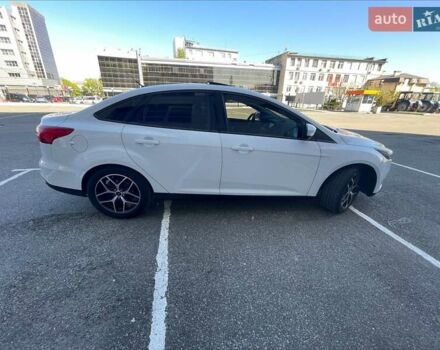 Білий Форд Фокус, об'ємом двигуна 2 л та пробігом 148 тис. км за 8888 $, фото 5 на Automoto.ua