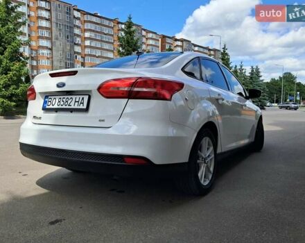 Белый Форд Фокус, объемом двигателя 2 л и пробегом 160 тыс. км за 9399 $, фото 9 на Automoto.ua