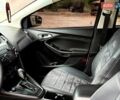 Белый Форд Фокус, объемом двигателя 2 л и пробегом 150 тыс. км за 8950 $, фото 19 на Automoto.ua
