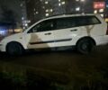 Білий Форд Фокус, об'ємом двигуна 1.8 л та пробігом 452 тис. км за 1900 $, фото 3 на Automoto.ua