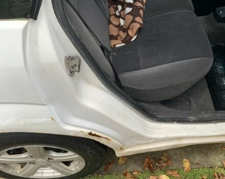 Белый Форд Фокус, объемом двигателя 1.8 л и пробегом 340 тыс. км за 2500 $, фото 7 на Automoto.ua