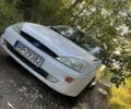 Білий Форд Фокус, об'ємом двигуна 1.8 л та пробігом 297 тис. км за 890 $, фото 1 на Automoto.ua