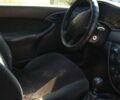 Белый Форд Фокус, объемом двигателя 1.8 л и пробегом 216 тыс. км за 720 $, фото 2 на Automoto.ua