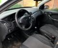 Белый Форд Фокус, объемом двигателя 1.6 л и пробегом 290 тыс. км за 3200 $, фото 4 на Automoto.ua
