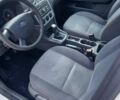 Білий Форд Фокус, об'ємом двигуна 1.8 л та пробігом 346 тис. км за 4000 $, фото 5 на Automoto.ua