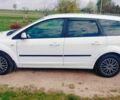 Білий Форд Фокус, об'ємом двигуна 1.8 л та пробігом 230 тис. км за 4100 $, фото 4 на Automoto.ua