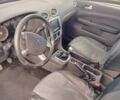 Білий Форд Фокус, об'ємом двигуна 1.8 л та пробігом 230 тис. км за 4100 $, фото 5 на Automoto.ua