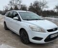 Белый Форд Фокус, объемом двигателя 2 л и пробегом 256 тыс. км за 5700 $, фото 1 на Automoto.ua