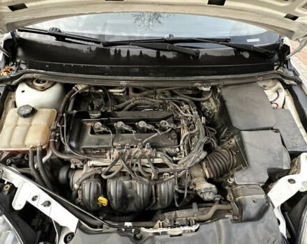 Белый Форд Фокус, объемом двигателя 1.8 л и пробегом 245 тыс. км за 4800 $, фото 21 на Automoto.ua