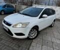 Белый Форд Фокус, объемом двигателя 2 л и пробегом 250 тыс. км за 5700 $, фото 1 на Automoto.ua