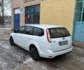 Білий Форд Фокус, об'ємом двигуна 2 л та пробігом 250 тис. км за 5699 $, фото 2 на Automoto.ua