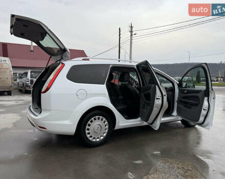 Белый Форд Фокус, объемом двигателя 1.8 л и пробегом 205 тыс. км за 5700 $, фото 23 на Automoto.ua