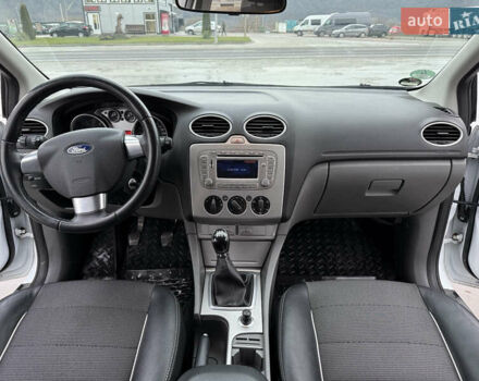 Белый Форд Фокус, объемом двигателя 1.8 л и пробегом 205 тыс. км за 5700 $, фото 31 на Automoto.ua