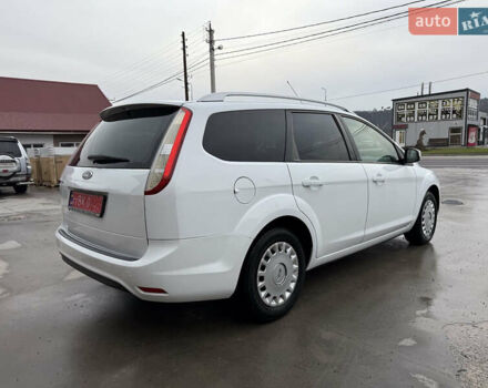 Белый Форд Фокус, объемом двигателя 1.8 л и пробегом 205 тыс. км за 5700 $, фото 9 на Automoto.ua