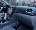 Білий Форд Фокус, об'ємом двигуна 1.6 л та пробігом 297 тис. км за 5299 $, фото 44 на Automoto.ua