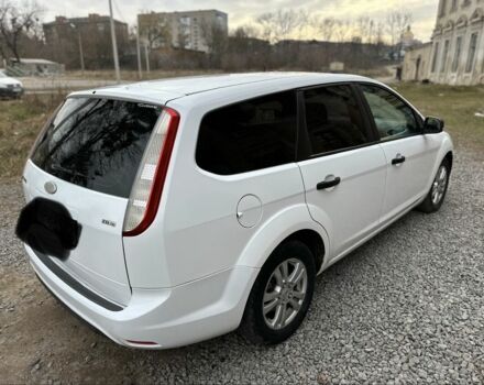 Белый Форд Фокус, объемом двигателя 1.6 л и пробегом 285 тыс. км за 2999 $, фото 3 на Automoto.ua