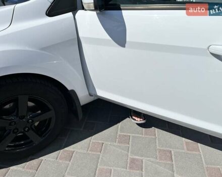 Білий Форд Фокус, об'ємом двигуна 1.8 л та пробігом 227 тис. км за 6000 $, фото 11 на Automoto.ua