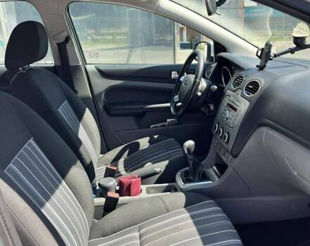 Білий Форд Фокус, об'ємом двигуна 1.8 л та пробігом 233 тис. км за 5750 $, фото 7 на Automoto.ua