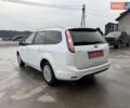 Белый Форд Фокус, объемом двигателя 1.8 л и пробегом 205 тыс. км за 5700 $, фото 6 на Automoto.ua