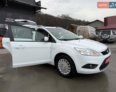 Белый Форд Фокус, объемом двигателя 1.8 л и пробегом 205 тыс. км за 5700 $, фото 26 на Automoto.ua