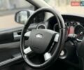 Білий Форд Фокус, об'ємом двигуна 2 л та пробігом 280 тис. км за 5200 $, фото 34 на Automoto.ua
