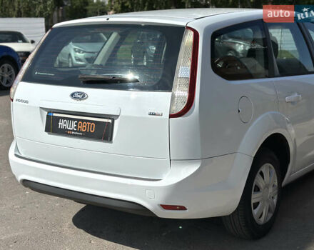 Білий Форд Фокус, об'ємом двигуна 1.56 л та пробігом 311 тис. км за 4700 $, фото 22 на Automoto.ua