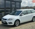 Білий Форд Фокус, об'ємом двигуна 2 л та пробігом 235 тис. км за 5750 $, фото 1 на Automoto.ua
