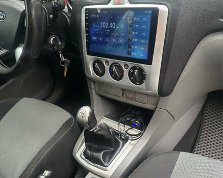 Белый Форд Фокус, объемом двигателя 1.56 л и пробегом 357 тыс. км за 5800 $, фото 7 на Automoto.ua